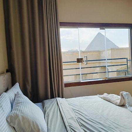 Magic Golden Pyramids View Hotel Kafret el-Gabal Exterior foto
