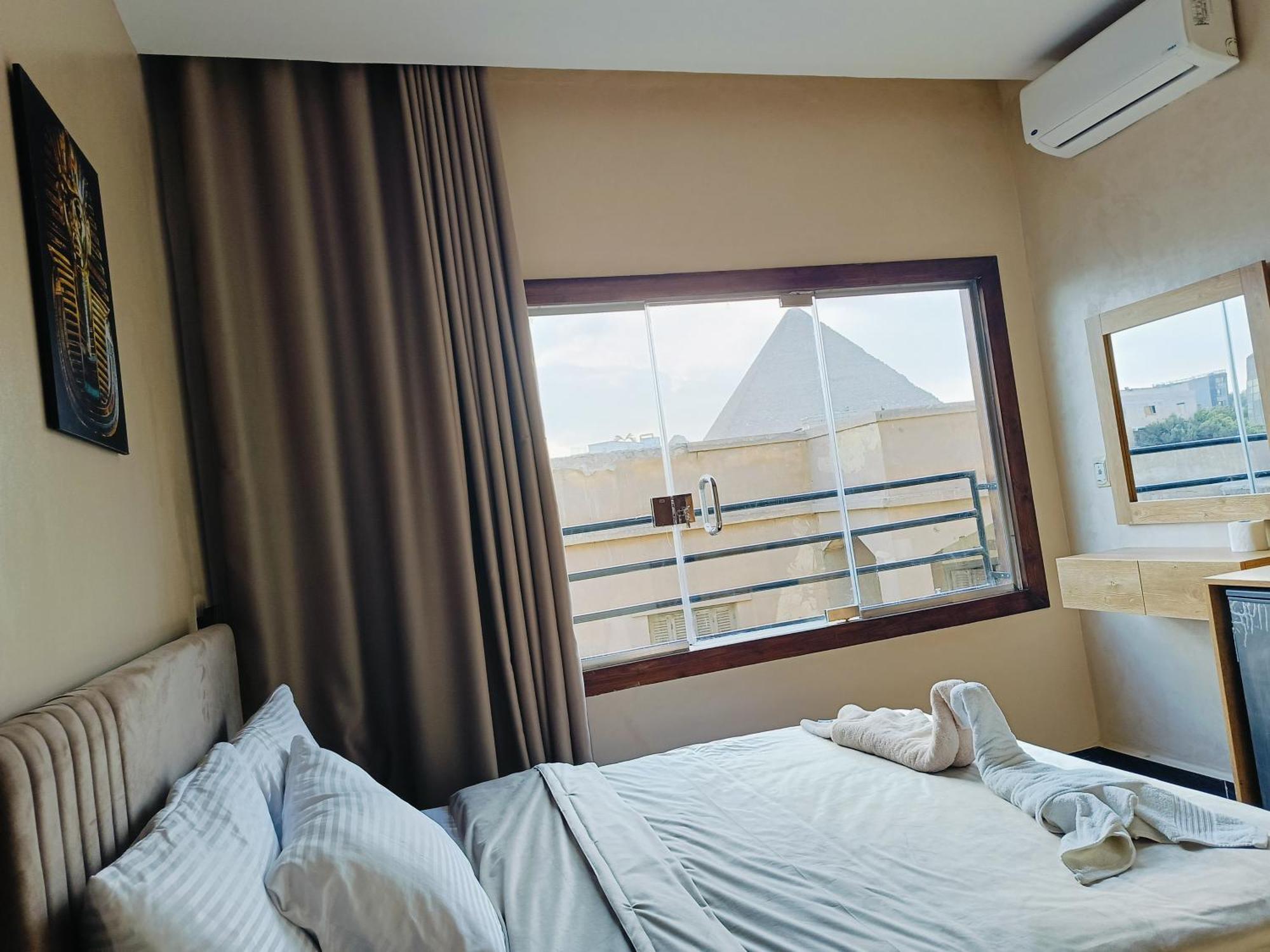 Magic Golden Pyramids View Hotel Kafret el-Gabal Exterior foto