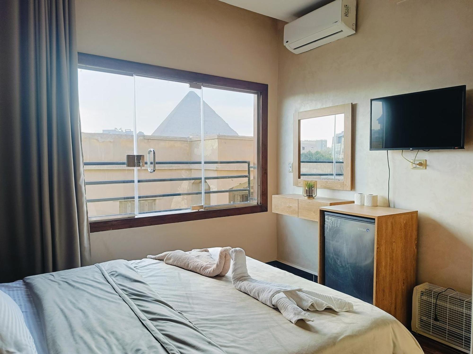 Magic Golden Pyramids View Hotel Kafret el-Gabal Exterior foto