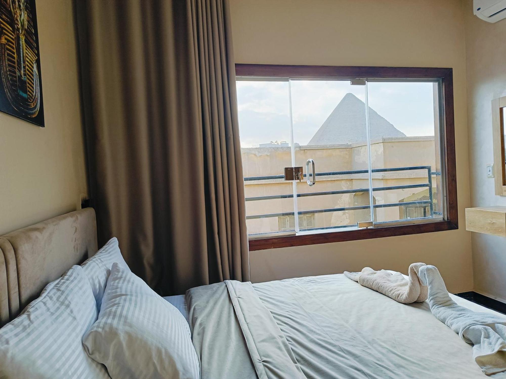 Magic Golden Pyramids View Hotel Kafret el-Gabal Exterior foto